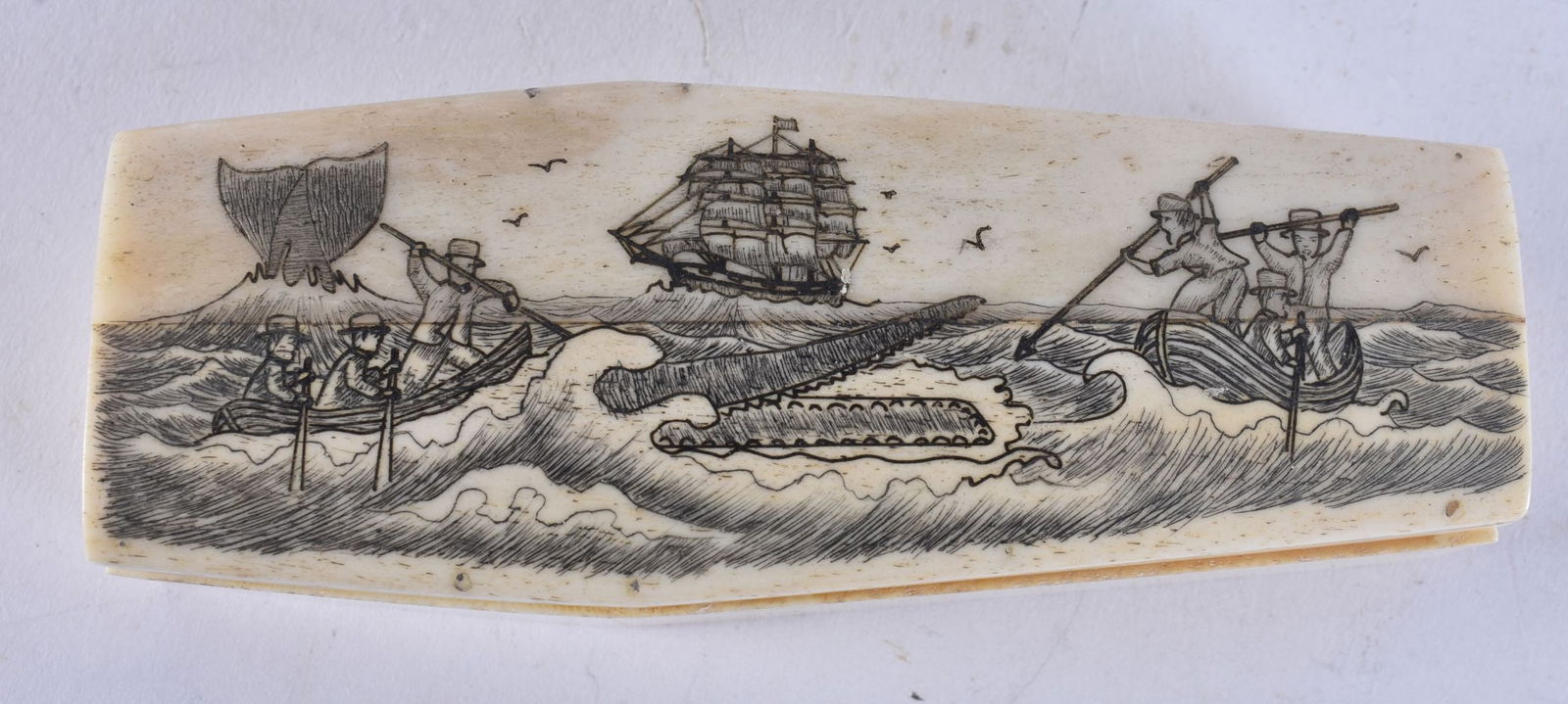 A BONE SCRIMSHAW COFFIN. 141 grams. 11.5 cm x 4.25 cm. (1 of 4)