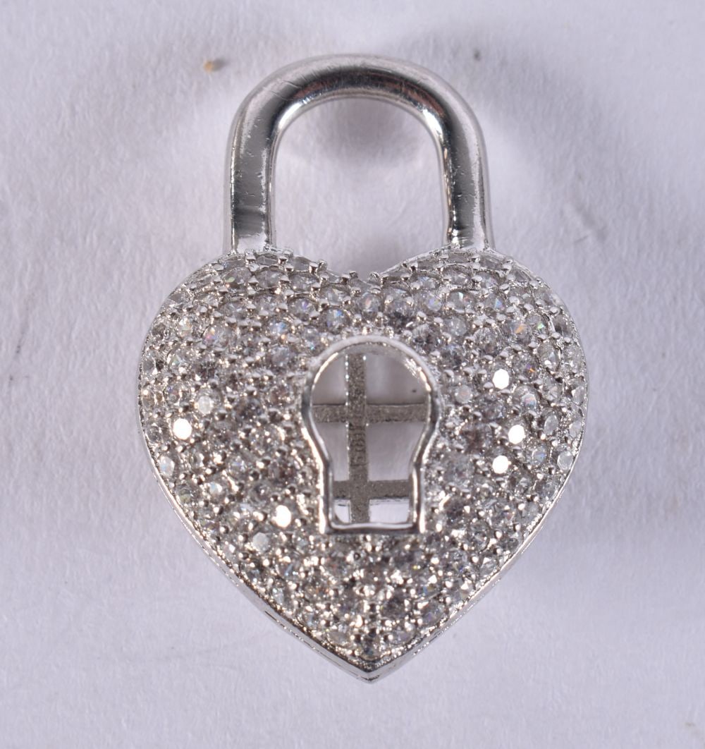 A SILVER HEART PENDANT. 5 grams. 2.5 cm x 2 cm. (1 of 2)