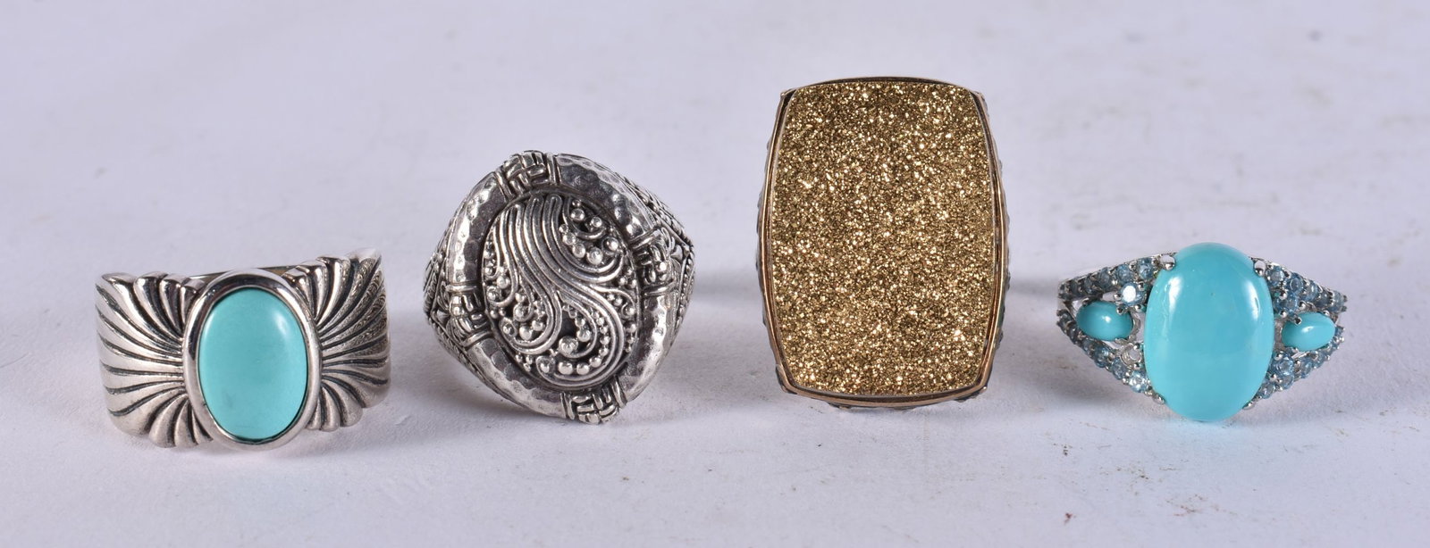 FOUR SILVER RINGS. S/T. 27.4 grams. (4) (1 of 3)