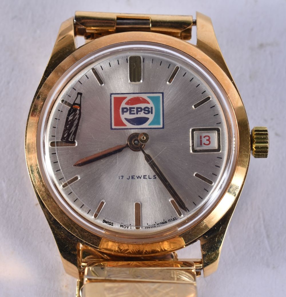 A PEPSI WRISTWATCH. Running. 3.75 cm wide. (1 of 5)