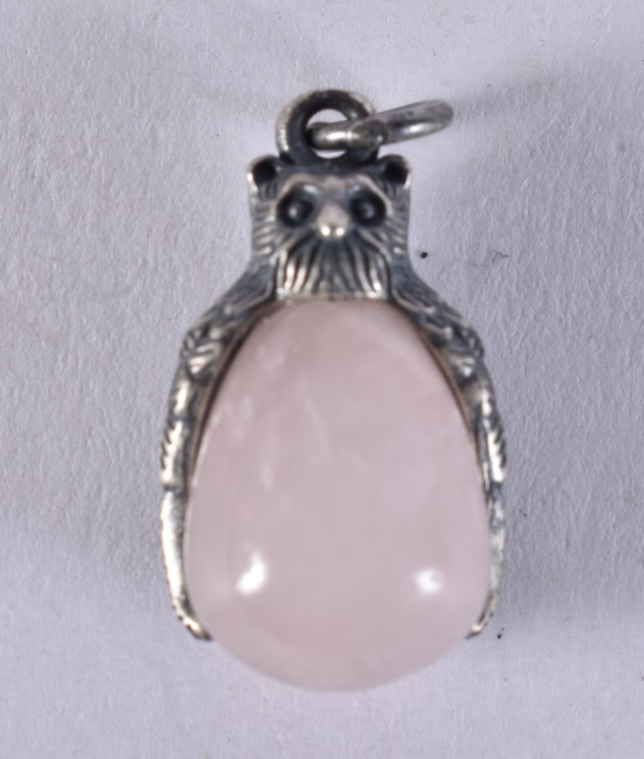 A SILVER AND ROSE QUARTZ PENDANT. 6 grams. 2.75 cm x 1.5 cm. (1 of 4)