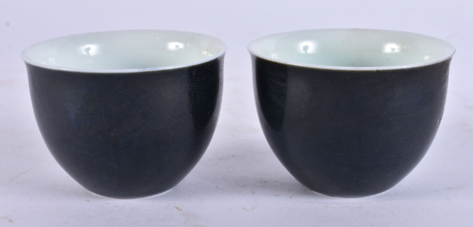 A PAIR OF CHINESE TEABOWLS. 7 cm wide. (1 of 3)