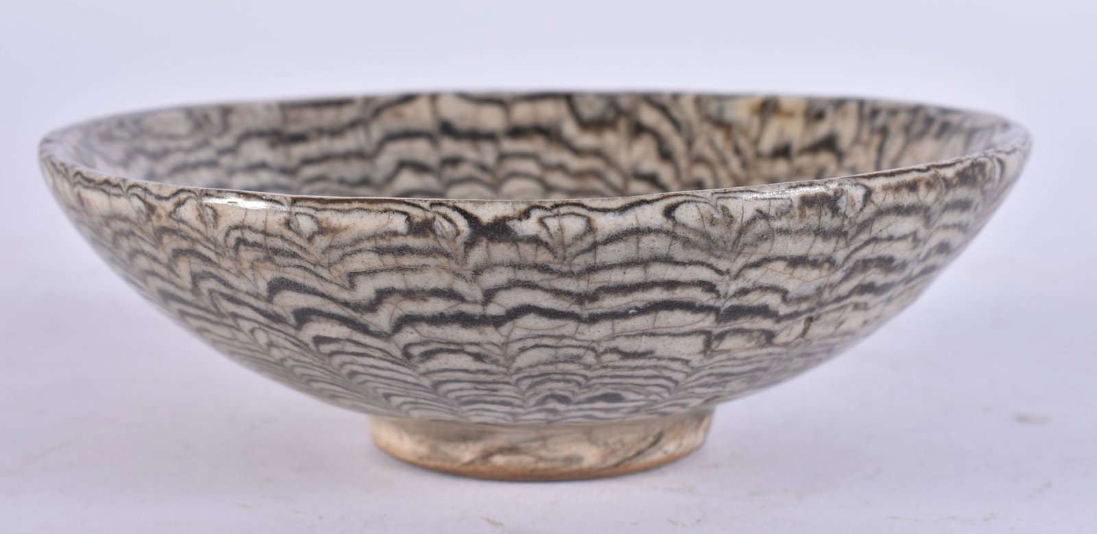 A CHINESE MARBLEISED POTTERY BOWL. 12.5 cm wide. (1 of 3)