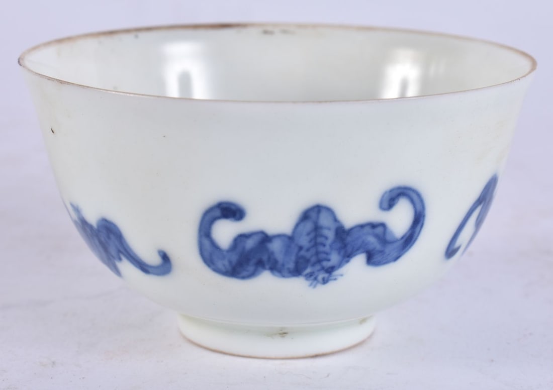 A CHINESE BLUE AND WHITE PORCELAIN BAT TEABOWL. 8.25 cm diameter. (1 of 4)