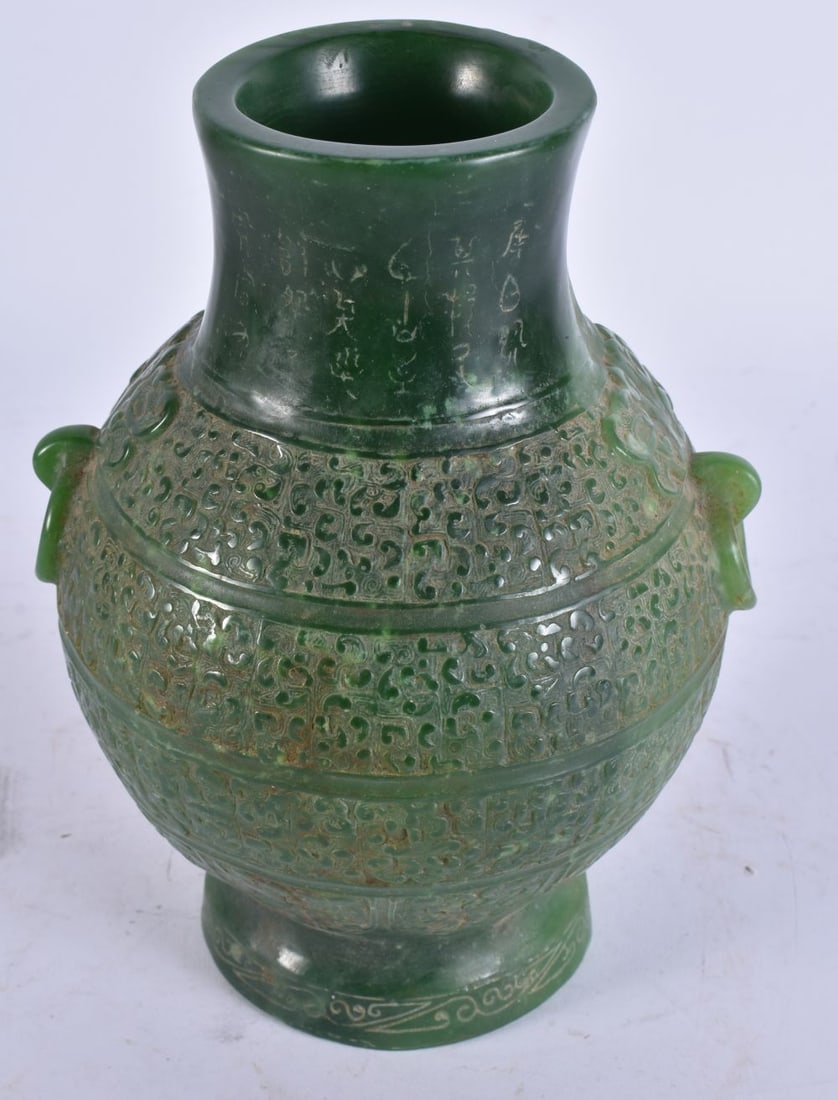 A CHINESE JADE TYPE VASE. 23.5 cm high. (1 of 5)