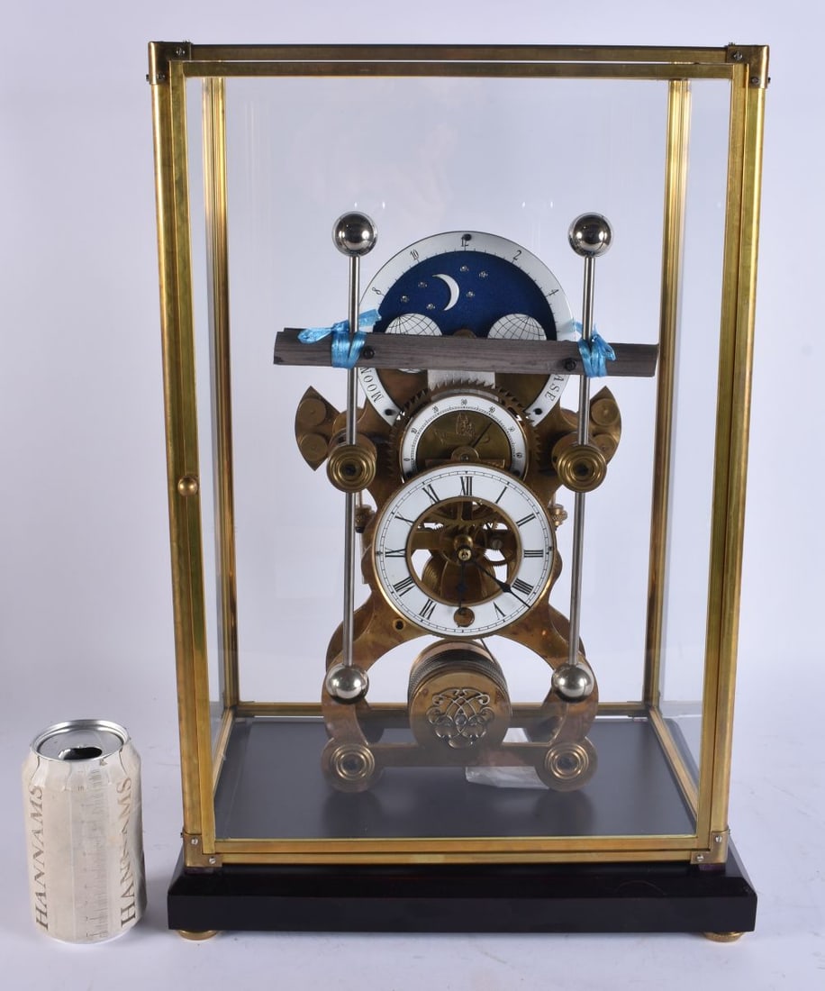 A LARGE SKELETON CLOCK. 48 cm high. (1 of 4)