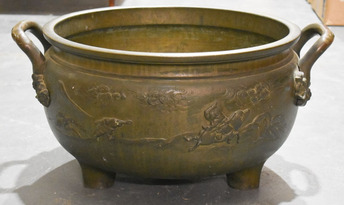 A LARGE 19TH CENTURY JAPANESE MEIJI PERIOD TWIN HANDLED BRONZE JARDINIERE decorated with figures and (1 of 7)