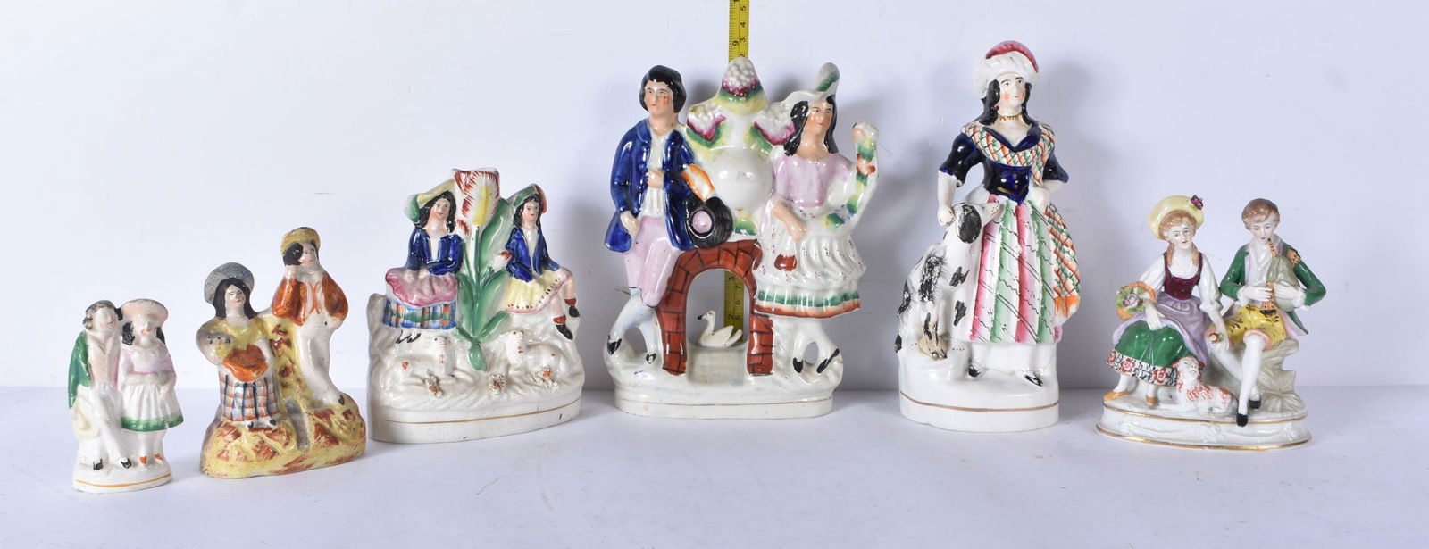 A collection of 19th Century Staffordshire porcelain figures 22cm (6) (1 of 19)