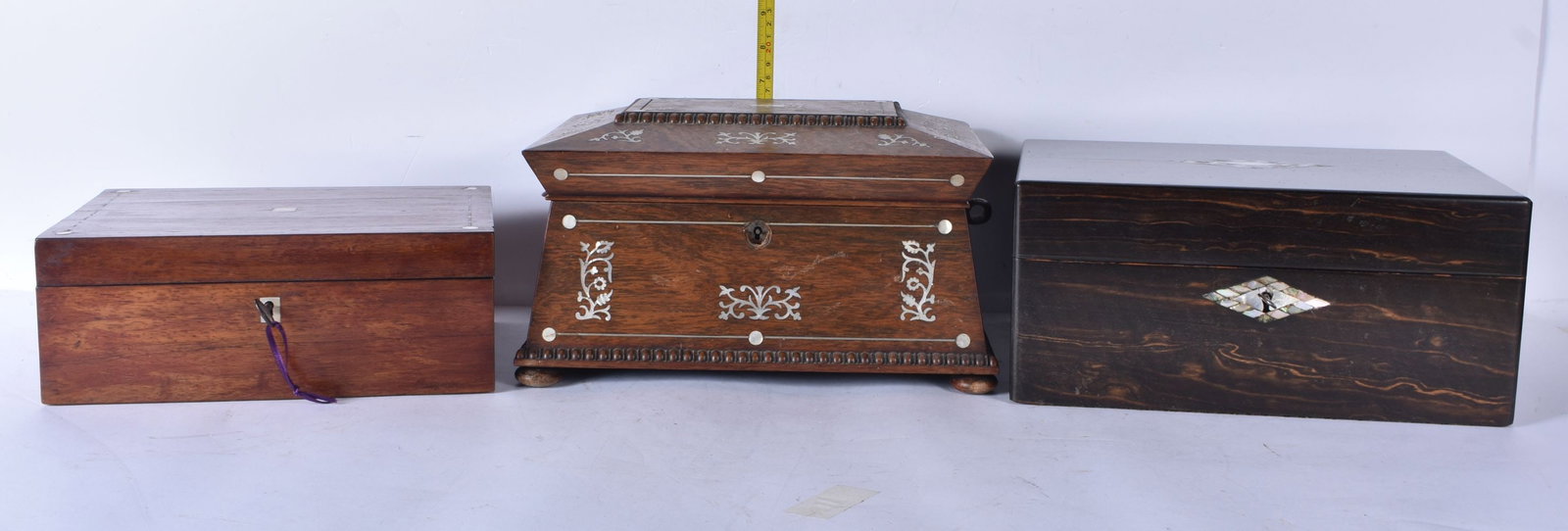 A mahogany mother of pearl inlaid jewellery box together with a mother of pearl sarcophagus trinket (1 of 12)