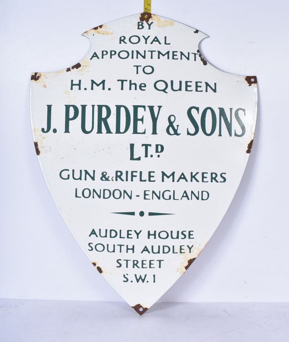A metal enamelled J Purdey & Sons dealership sign 51 x 39 cm: A metal enamelled J Purdey & Sons dealership sign 51 x 39 cm