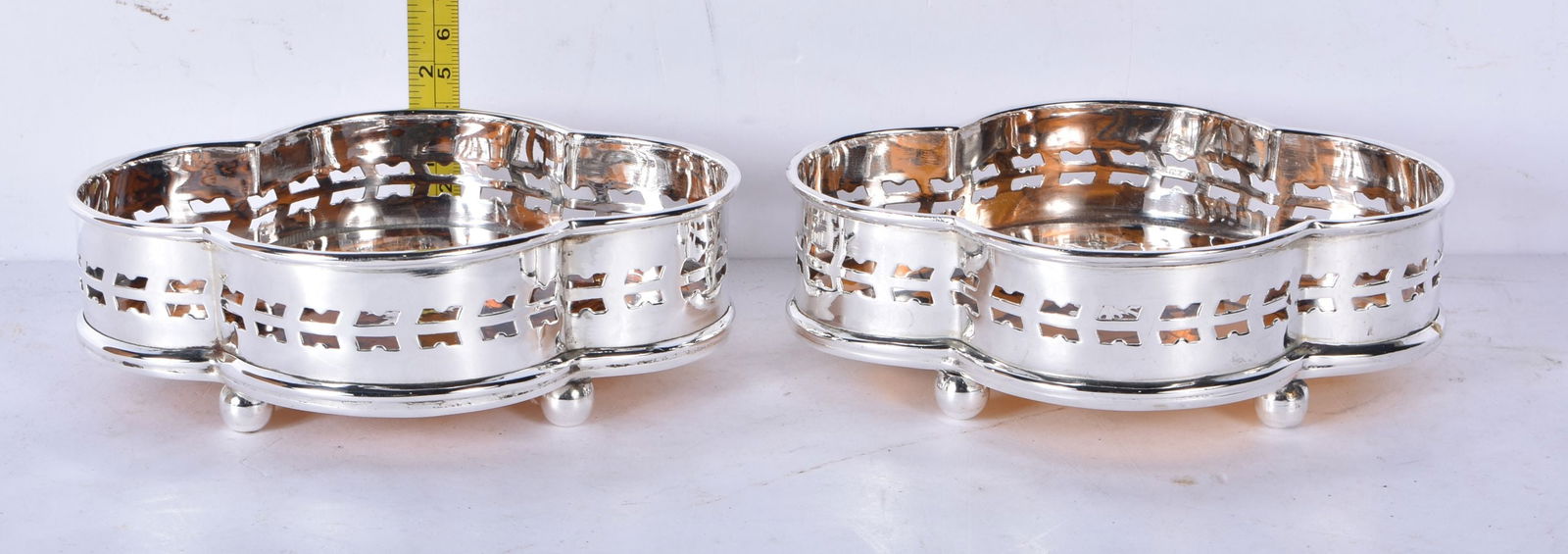 A pair of silver plated and faux tortoiseshell drinks coasters 5 x 15 x 12cm (2): A pair of silver plated and faux tortoiseshell drinks coasters 5 x 15 x 12cm (2)