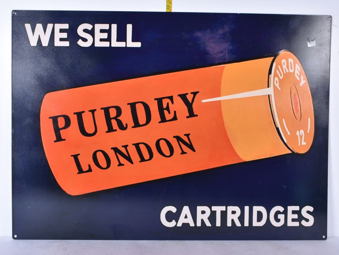 A Purdey Shotguns tin sign 70 x 50cm: A Purdey Shotguns tin sign 70 x 50cm