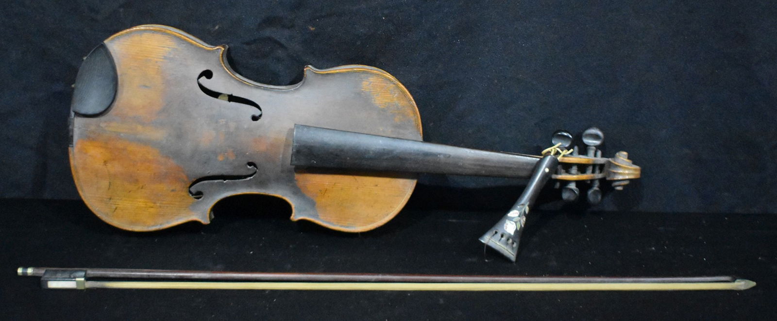A violin by Antonius Stradivarius Cremonensis together with a bow 60 x 21.5cm (2) (1 of 5)