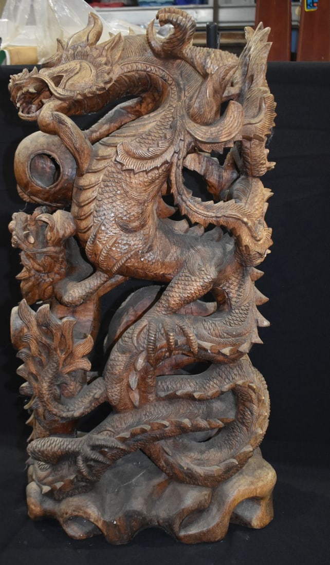A large South East Asian carved hardwood dragon group 80cm: A large South East Asian carved hardwood dragon group 80cm