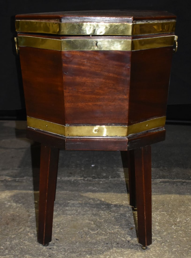 A Georgian Satinwood and brass bound cellarette on castors 69 x 45.5cm: A Georgian Satinwood and brass bound cellarette on castors 69 x 45.5cm
