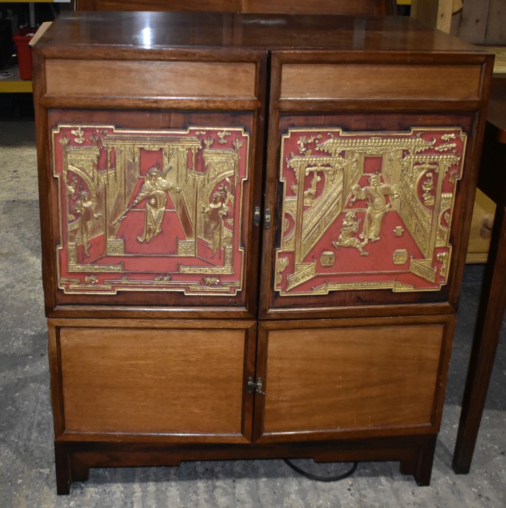 A 20th Century Chinese hardwood cabinet with lacquered relief panels to the cabinet doors 102 x 88 x (1 of 7)