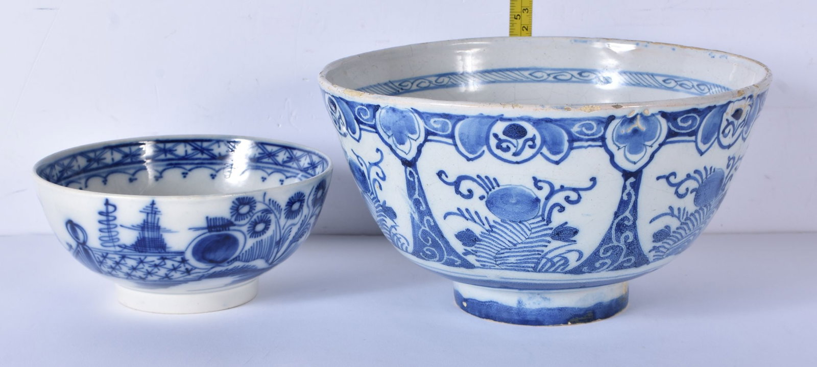 A 19th Century Dutch Delft bowl together with a small English blue and white bowl 12 x 21cm (2) (1 of 6)