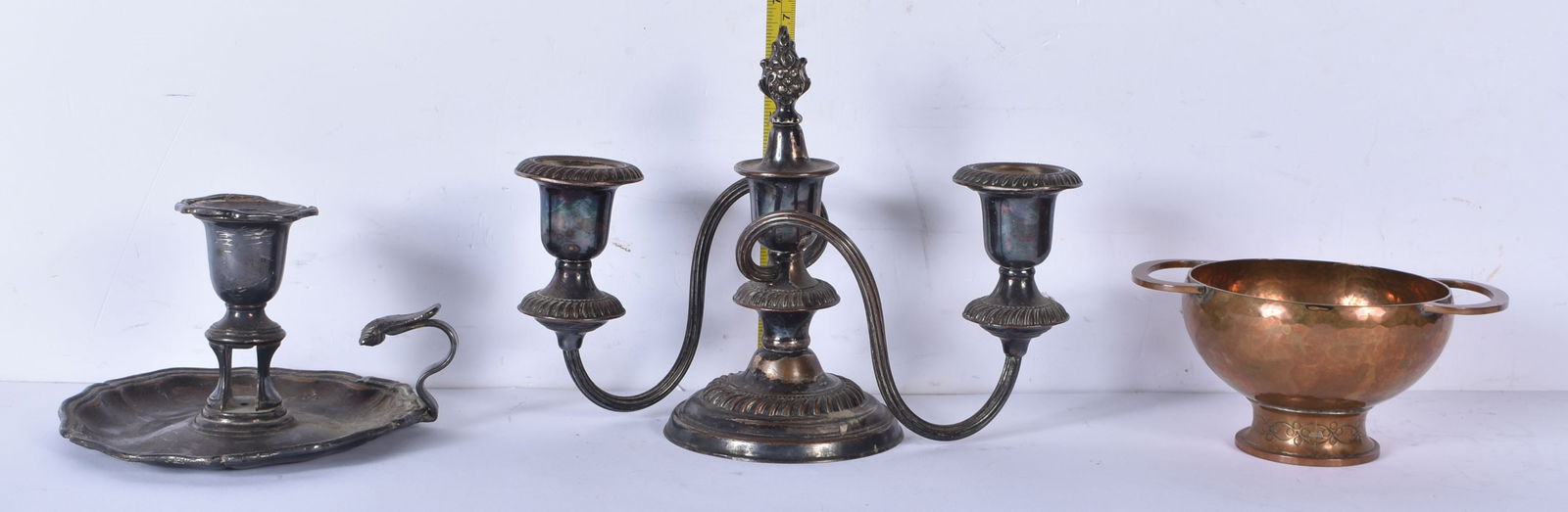 An antique silver plate Candelabra together with a silver plate Chamber Stick and a copper Vessel 1 (1 of 4)