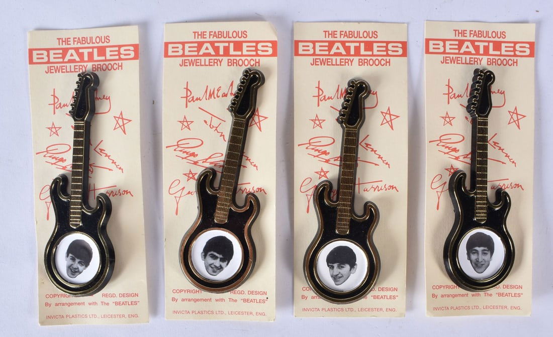 Four Beatles Brooches, in the shape of guitars. (1 of 5)