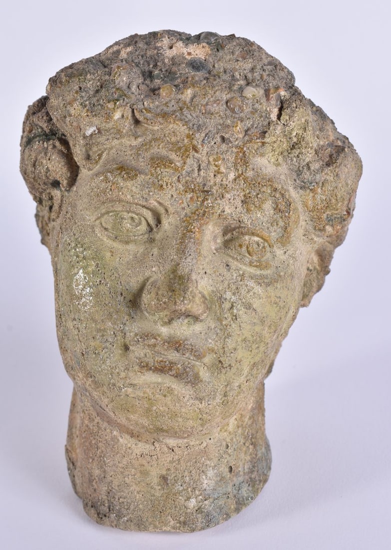A LATE 19TH CENTURY EUROPEAN GRAND TOUR STONE HEAD OF A MALE After the Antiquity. 14cm x 9 cm.: A LATE 19TH CENTURY EUROPEAN GRAND TOUR STONE HEAD OF A MALE After the Antiquity. 14cm x 9 cm.