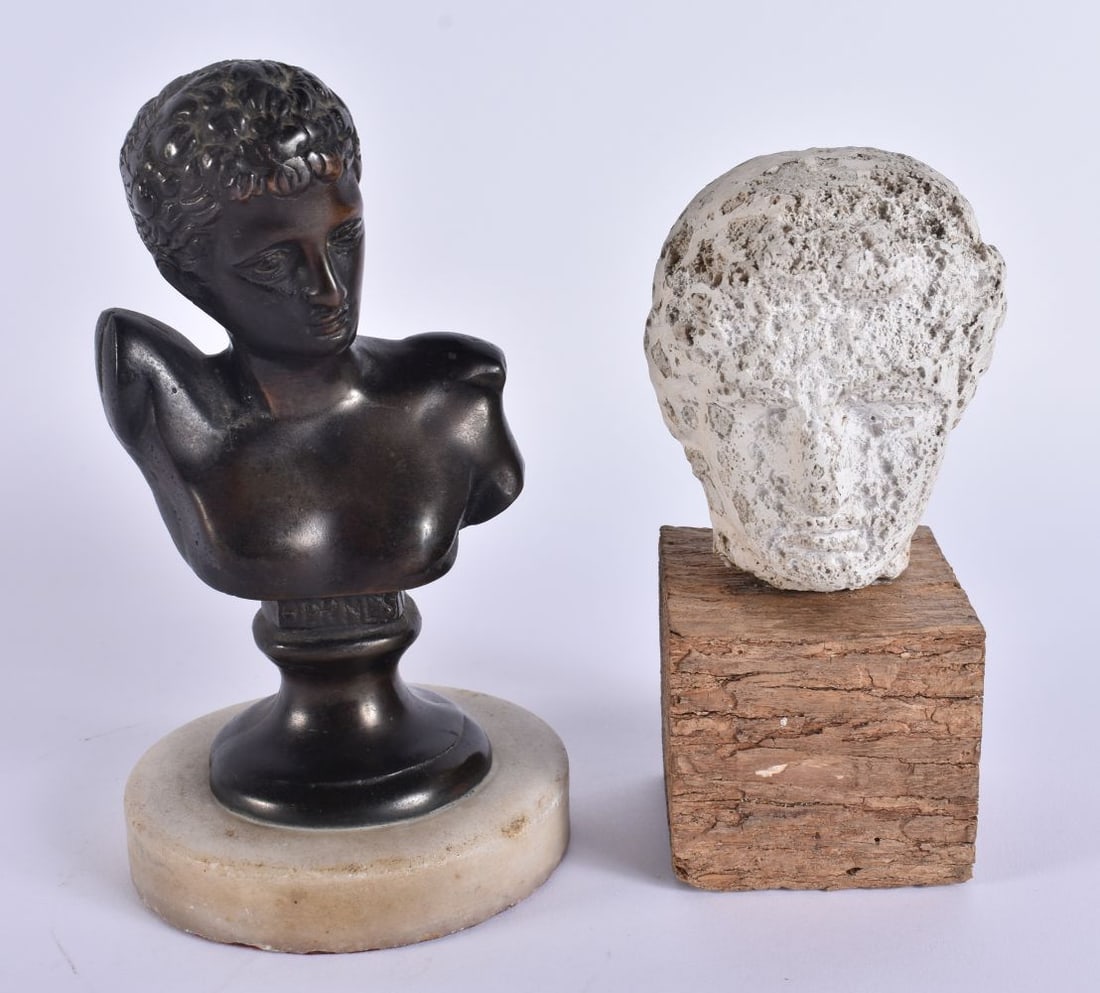 AN EARLY 20TH CENTURY GRAND TOUR BRONZE BUST OF HERMES together with a porous head of a male. Larges: AN EARLY 20TH CENTURY GRAND TOUR BRONZE BUST OF HERMES together with a porous head of a male. Largest 17 cm high. (2)