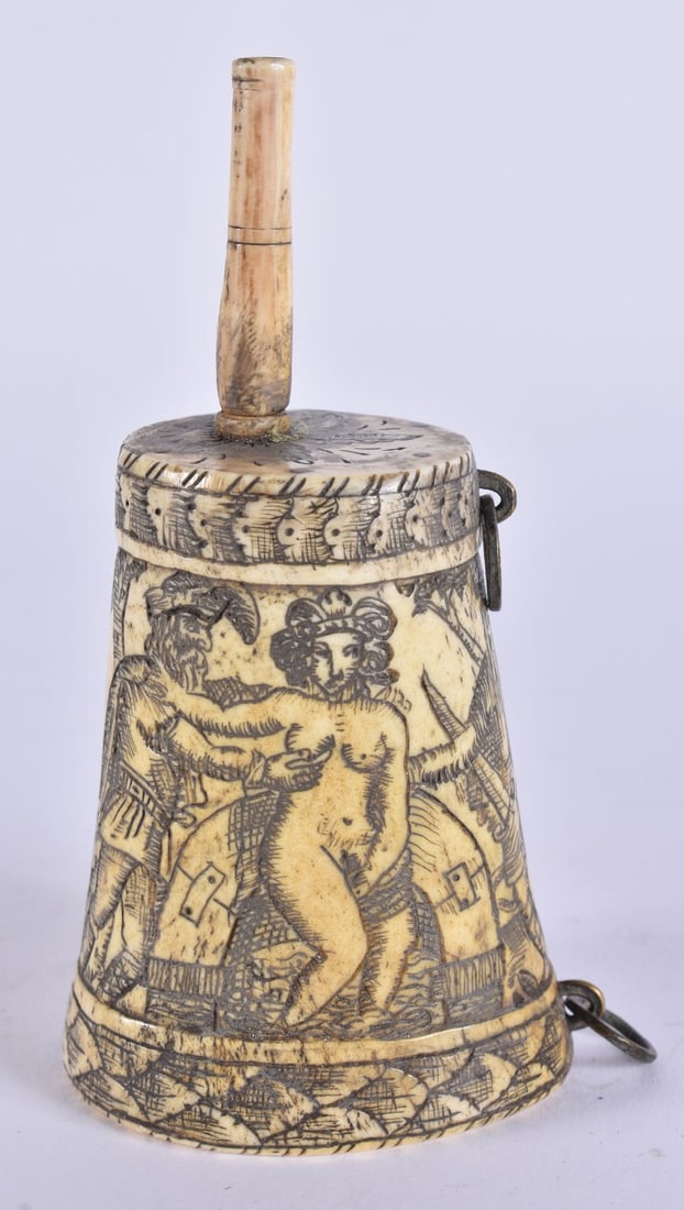 A RARE EARLY 19TH CENTURY EUROPEAN EROTIC PRISONER OF WAR POWDER FLASK modelled as knights beside a: A RARE EARLY 19TH CENTURY EUROPEAN EROTIC PRISONER OF WAR POWDER FLASK modelled as knights beside a nude female. 13 cm high.