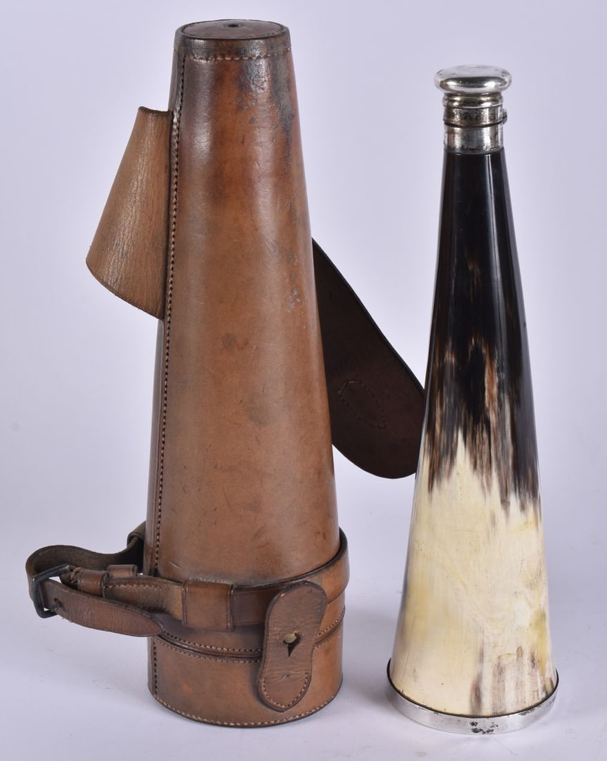 A FINE VICTORIAN SCOTTISH CARVED HORN SPIRIT FLASK within fitted leather case. 26 cm high.: A FINE VICTORIAN SCOTTISH CARVED HORN SPIRIT FLASK within fitted leather case. 26 cm high.
