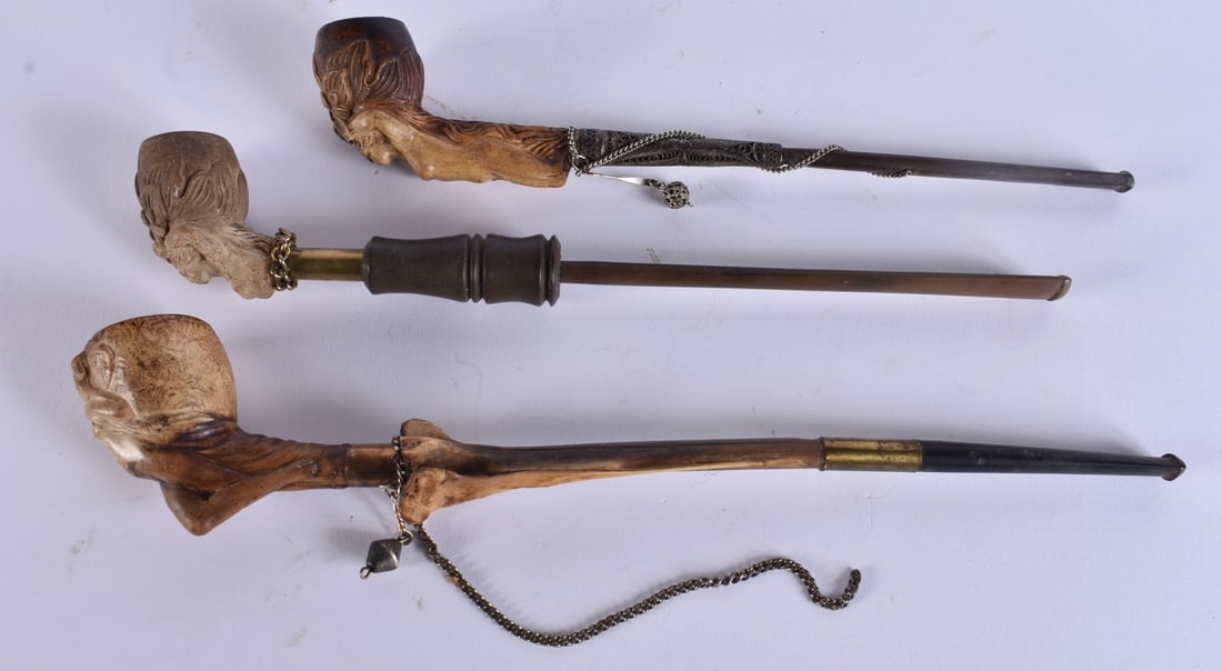 THREE ANTIQUE EROTIC MEERSCHAUM PIPES. Largest 26 cm long. (3): THREE ANTIQUE EROTIC MEERSCHAUM PIPES. Largest 26 cm long. (3)