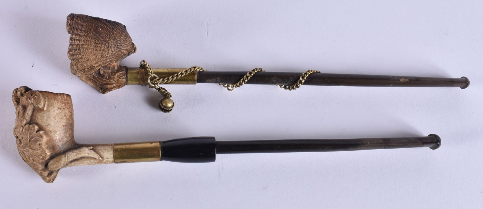 TWO ANTIQUE MEERSCHAUM SHELL AND LEAF FIGURAL PIPES. 21 cm wide. (2): TWO ANTIQUE MEERSCHAUM SHELL AND LEAF FIGURAL PIPES. 21 cm wide. (2)