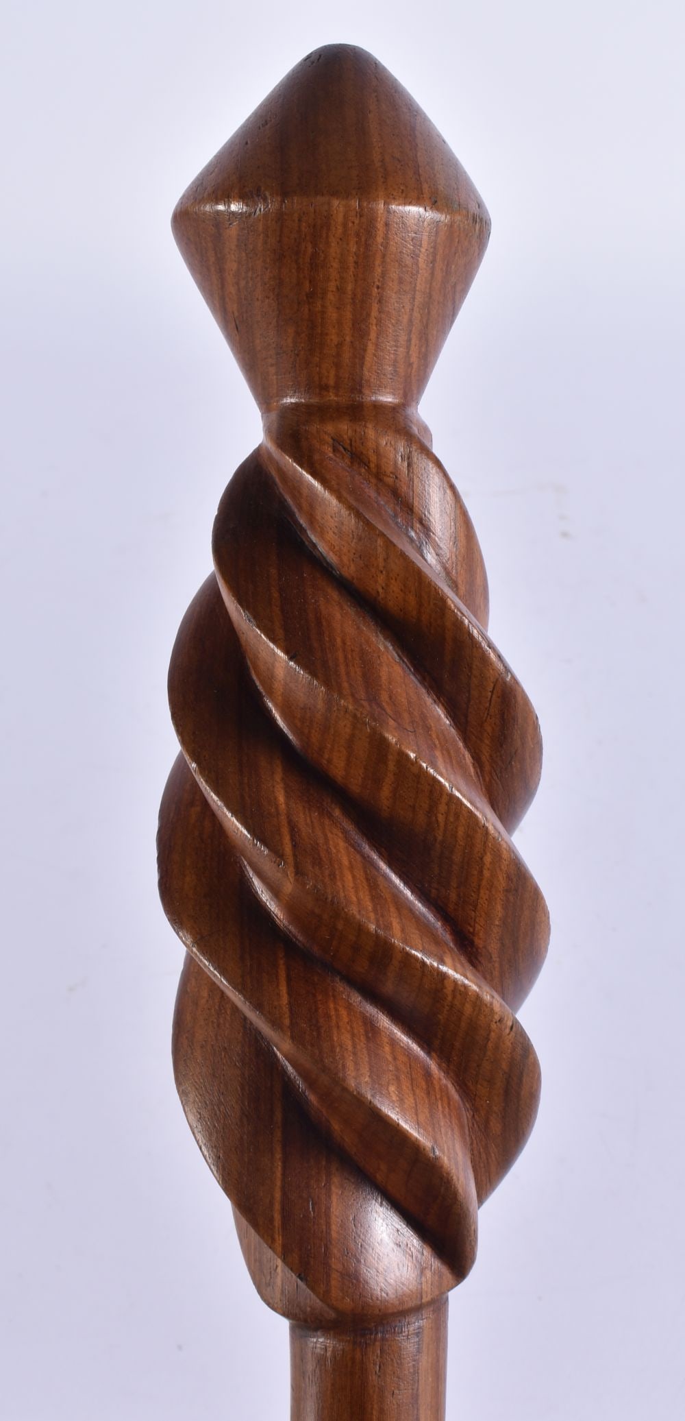 AN UNUSUAL TRIBAL CARVED SPIRALLY FORMED WALKING CANE. 82 cm long.: AN UNUSUAL TRIBAL CARVED SPIRALLY FORMED WALKING CANE. 82 cm long.
