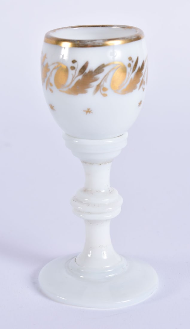 AN UNUSUAL VICTORIAN OPALINE GLASS CUP. 9.25 cm high. (1 of 3)