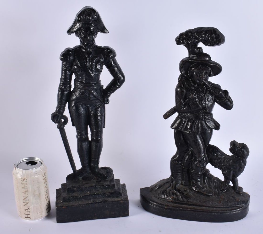 TWO VICTORIAN CAST IRON FIGURAL DOOR STOPS. Largest 41 cm high. (2): TWO VICTORIAN CAST IRON FIGURAL DOOR STOPS. Largest 41 cm high. (2)