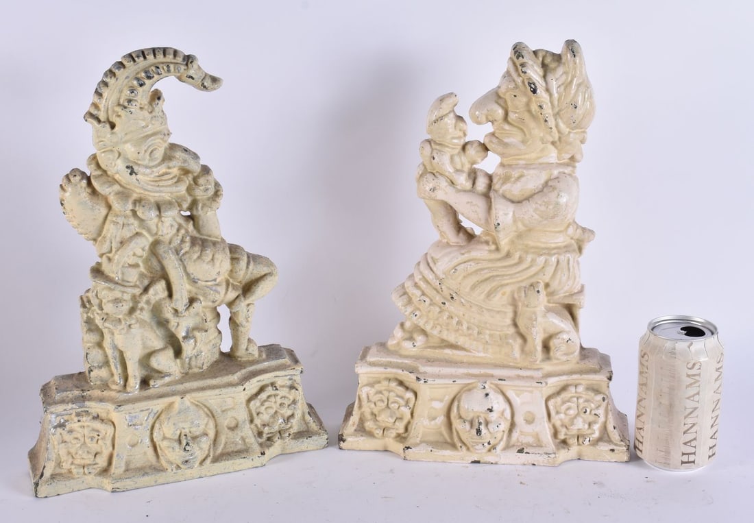 A PAIR OF VICTORIAN WHITE PAINTED PUNCH AND JUDY CAST IRON DOOR STOPS. 35 cm x 15 cm. (1 of 5)