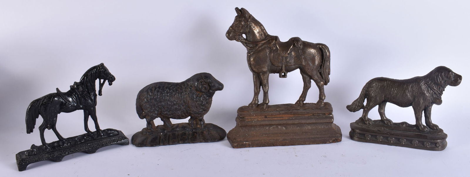 A GROUP OF FOUR VICTORIAN CAST IRON ANIMAL DOOR STOPS. Largest 24 cm x 30 cm. (4) (1 of 6)