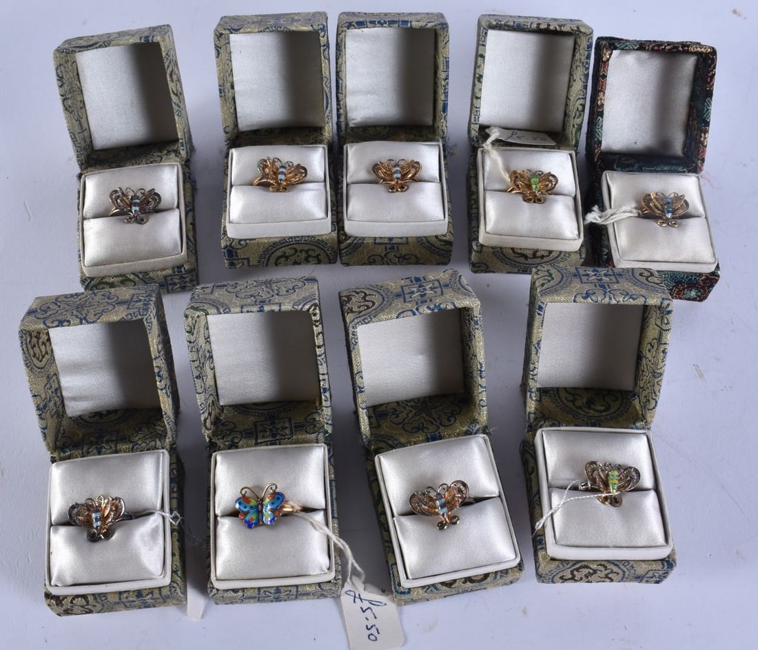 NINE CHINESE SILVER AND ENAMEL RINGS in various forms and sizes. (9): NINE CHINESE SILVER AND ENAMEL RINGS in various forms and sizes. (9)