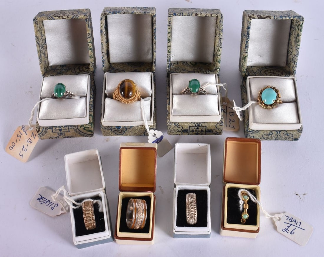 EIGHT CHINESE SILVER RINGS in various forms and sizes. (8) (1 of 5)