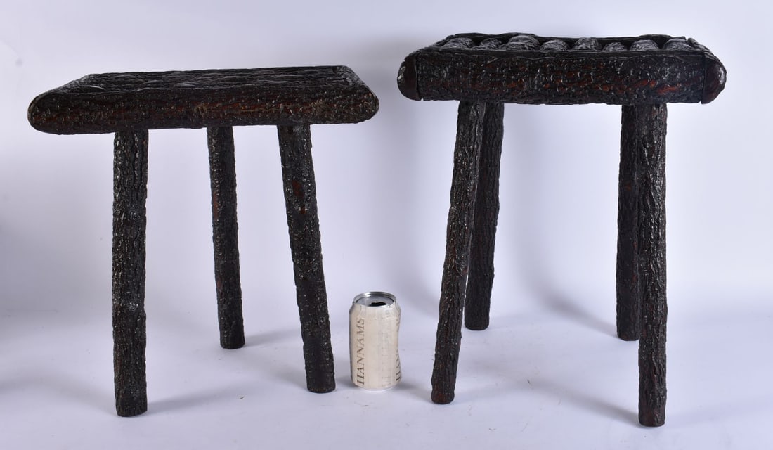 A RARE NEAR PAIR OF ANTIQUE BLACK FOREST BAVARIAN CARVED WOOD STOOLS. Largest 43 cm x 32 cm x 25 cm.: A RARE NEAR PAIR OF ANTIQUE BLACK FOREST BAVARIAN CARVED WOOD STOOLS. Largest 43 cm x 32 cm x 25 cm.