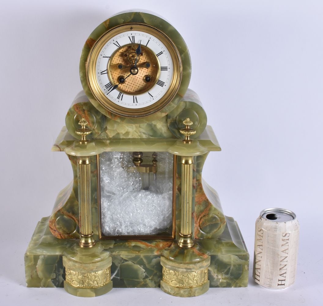 A FINE AND LARGE LATE 19TH CENTURY FRENCH ONYX AND ORMOLU MANTEL CLOCK of architectural form. 40 cm: A FINE AND LARGE LATE 19TH CENTURY FRENCH ONYX AND ORMOLU MANTEL CLOCK of architectural form. 40 cm x 34 cm