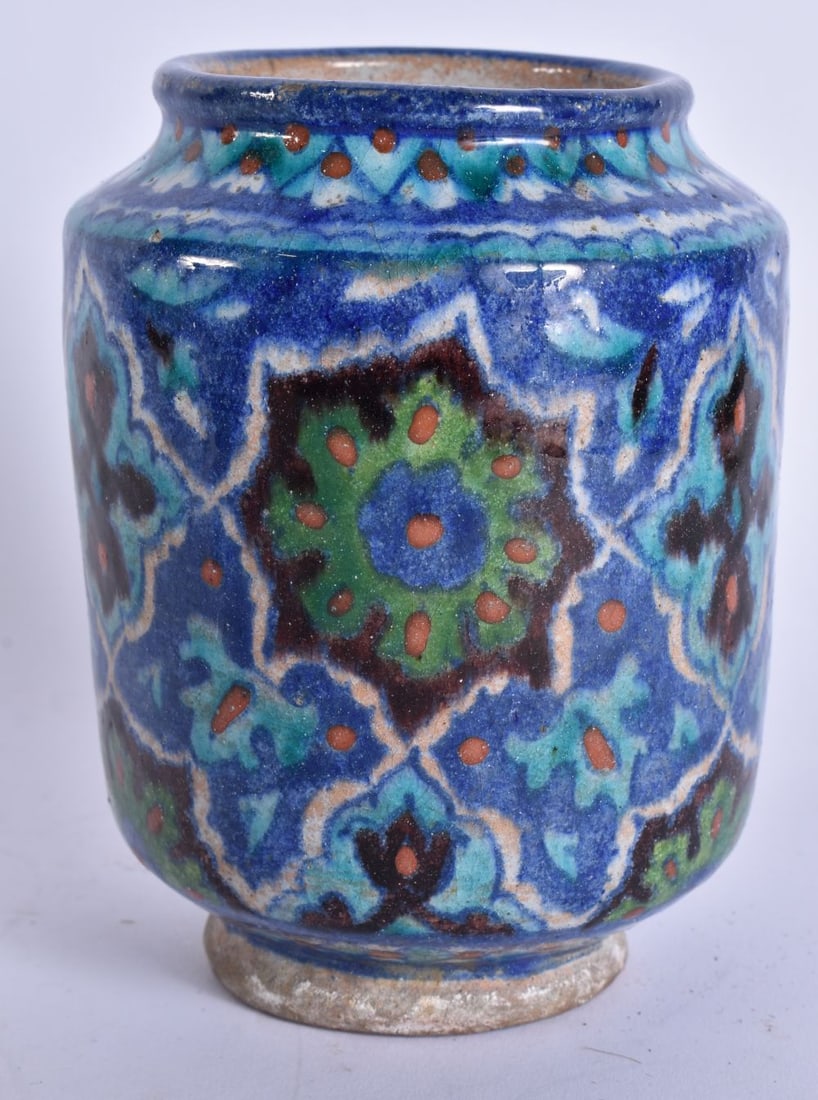 A SMALLER MIDDLE EASTERN PALESTINE IZNIK POTTERY VASE painted with motifs. 14cm high. (1 of 5)