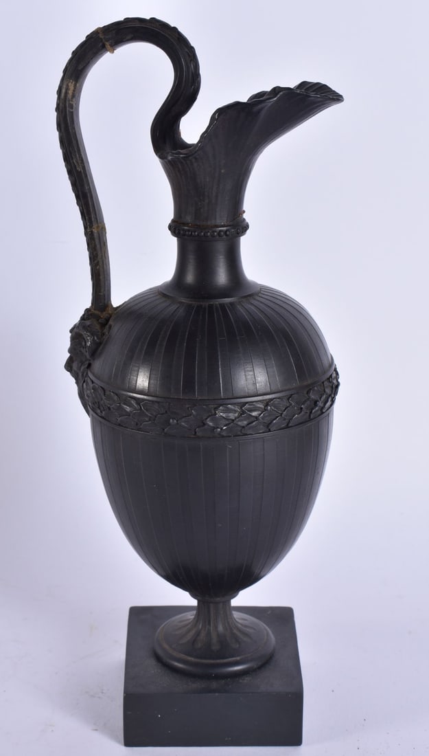 A WEDGWOOD & BENTLEY BLACK BASALT ANTIQUITY EWER. 25 cm high.: A WEDGWOOD & BENTLEY BLACK BASALT ANTIQUITY EWER. 25 cm high.