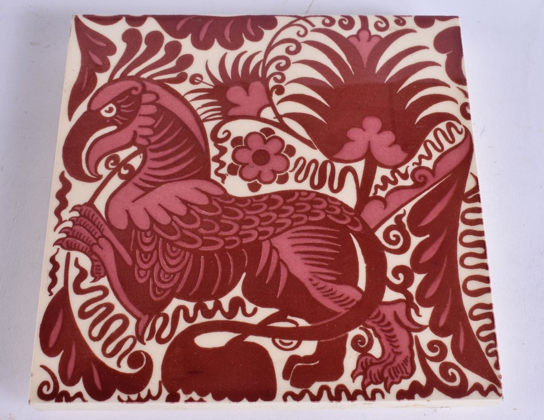 AN UNUSUAL IRON RED PAINTED GRIFFIN BEAST POTTERY TILE. 15 cm square.: AN UNUSUAL IRON RED PAINTED GRIFFIN BEAST POTTERY TILE. 15 cm square.