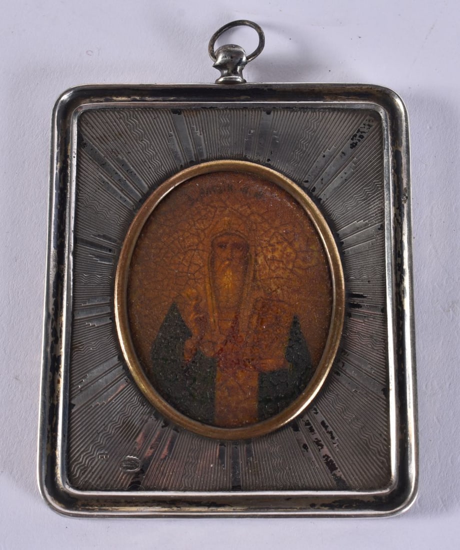 A 19TH CENTURY RUSSIAN SILVER MOUNTED WOOD ICON. 49 grams. 8.75 cm x 7.25 cm.: A 19TH CENTURY RUSSIAN SILVER MOUNTED WOOD ICON. 49 grams. 8.75 cm x 7.25 cm.