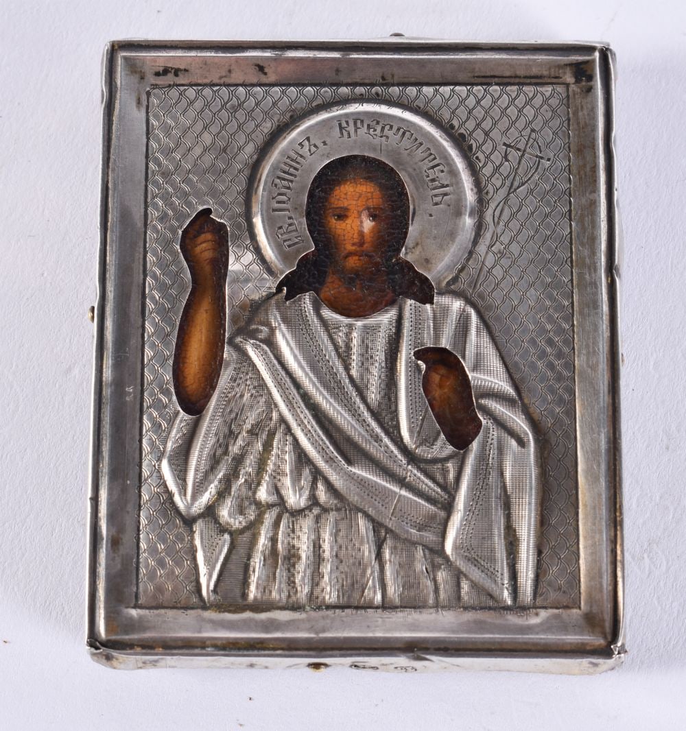 A 19TH CENTURY RUSSIAN SILVER MOUNTED WOOD ICON. 23 grams. 7 cm x 5.75 cm.: A 19TH CENTURY RUSSIAN SILVER MOUNTED WOOD ICON. 23 grams. 7 cm x 5.75 cm.