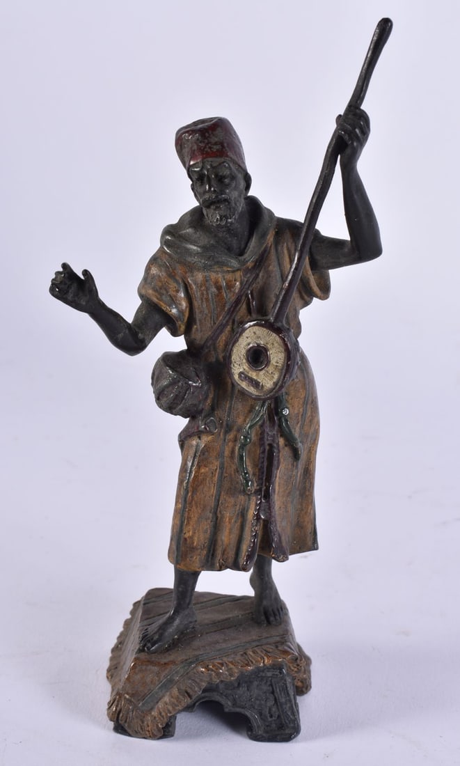 A COLD PAINTED BRONZE MIDDLE EASTERN FIGURE. 17.5 cm high. (1 of 7)
