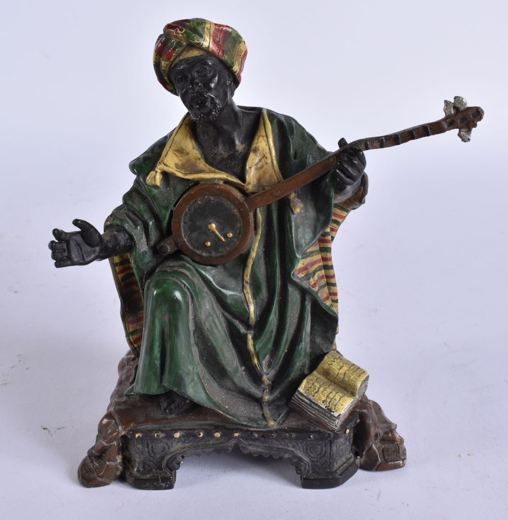 A COLD PAINTED BRONZE MIDDLE EASTERN FIGURE. 17.5 cm high.: A COLD PAINTED BRONZE MIDDLE EASTERN FIGURE. 17.5 cm high.