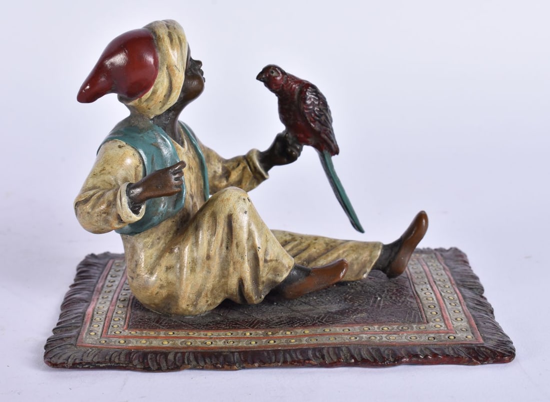 A CONTINENTAL COLD PAINTED BRONZE BIRD CHARMER. 10 cm wide.: A CONTINENTAL COLD PAINTED BRONZE BIRD CHARMER. 10 cm wide.
