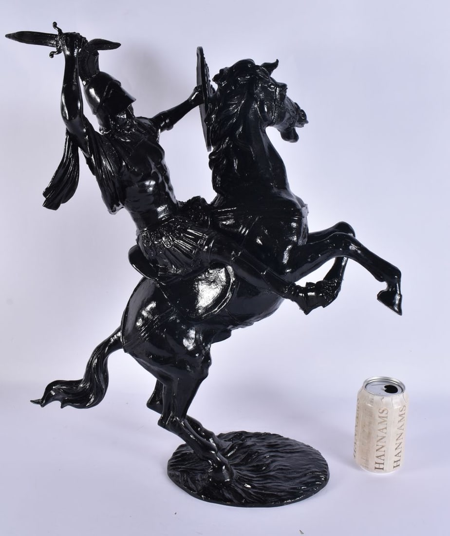 A VICTORIAN PAINTED SPELTER FIGURE OF A WARRIOR ON HORSEBACK. 58cm x 30 cm.: A VICTORIAN PAINTED SPELTER FIGURE OF A WARRIOR ON HORSEBACK. 58cm x 30 cm.