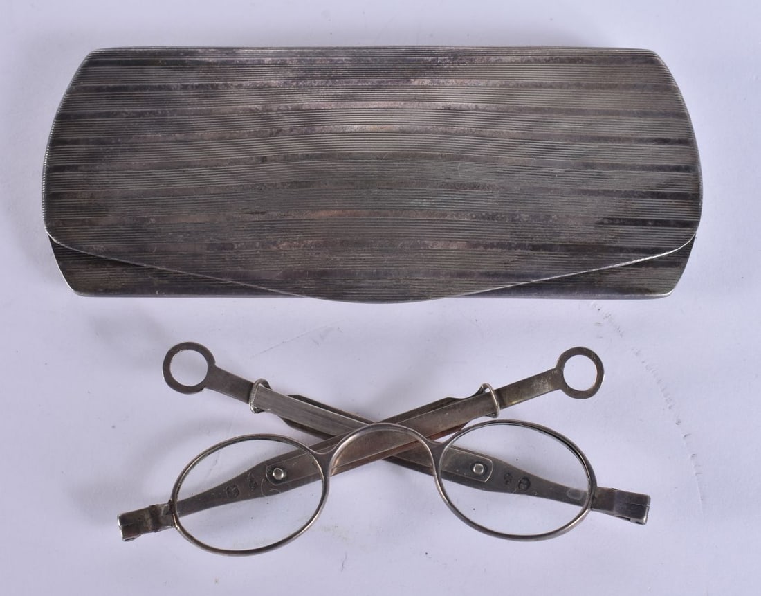 AN ALPACA GLASS CASE with silver spectacles. 128 grams overall. 13.5 cm wide. (2): AN ALPACA GLASS CASE with silver spectacles. 128 grams overall. 13.5 cm wide. (2)