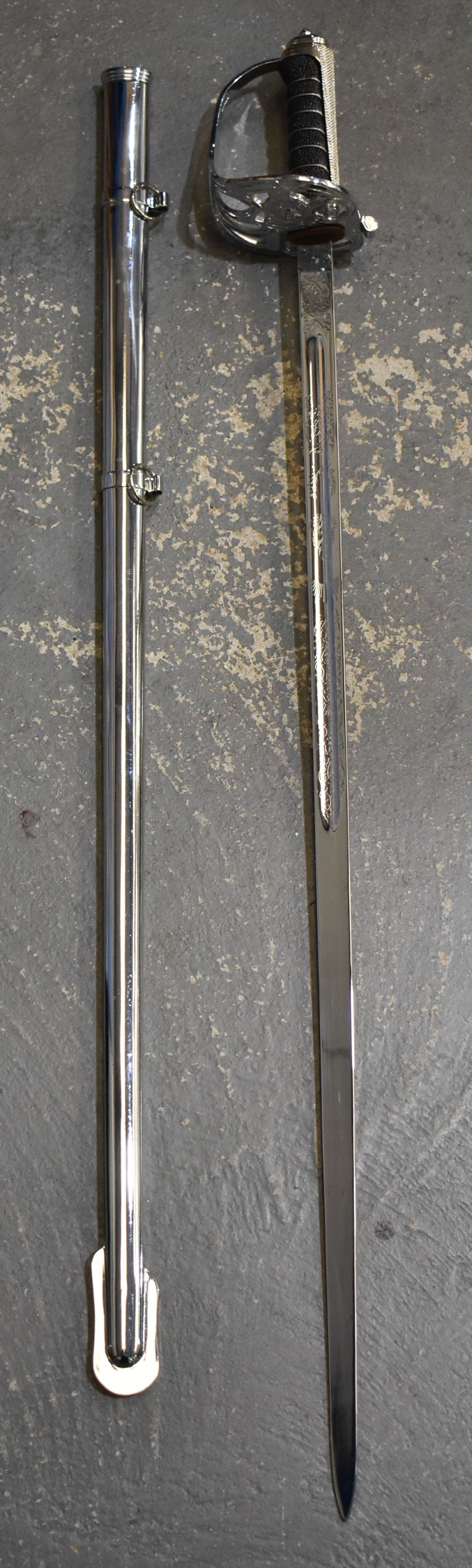 AN ENGLISH SWORD. 100 cm long. WE ARE UNABLE TO OFFER IN HOUSE SHIPPING ON THIS LOT: AN ENGLISH SWORD. 100 cm long. WE ARE UNABLE TO OFFER IN HOUSE SHIPPING ON THIS LOT