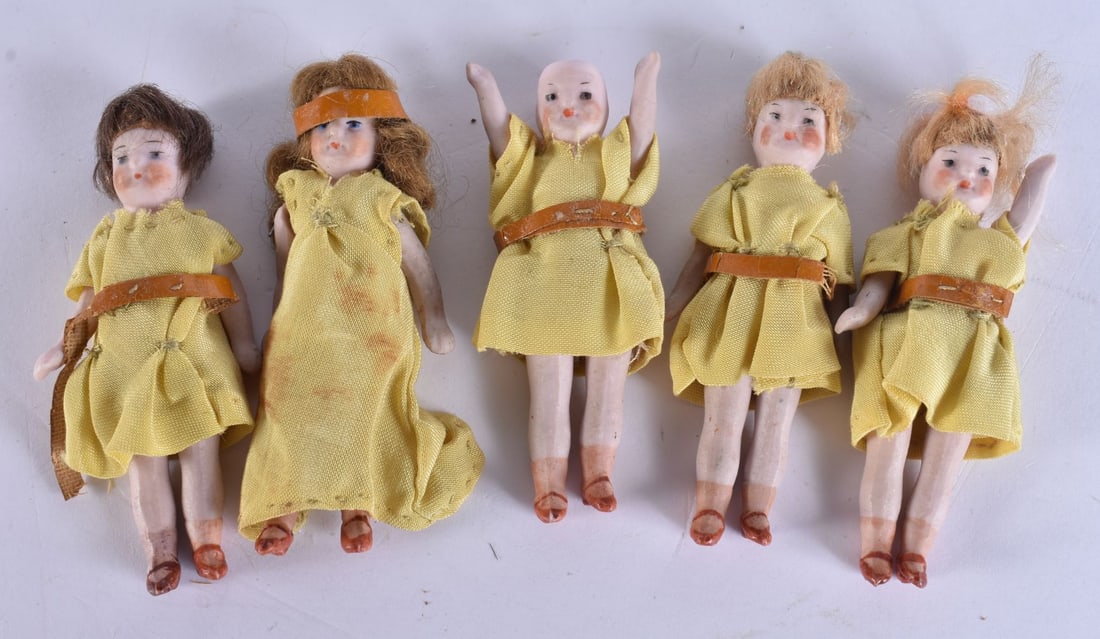 A COLLECTION OF VINTAGE MINIATURE BISQUE HEADED DOLLS. 7.5 cm high. (5) (1 of 5)
